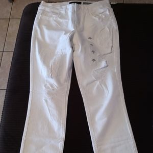 White jeans with lace patch